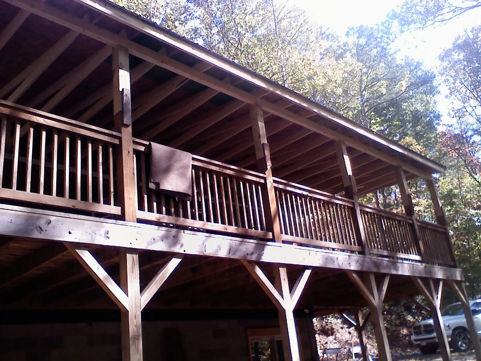 Timber framing under a new elevated porch and deck — Roof Leak Repair in Atlanta by Roofing Brothers
